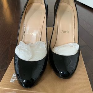 Christian Louboutin black patent pumps